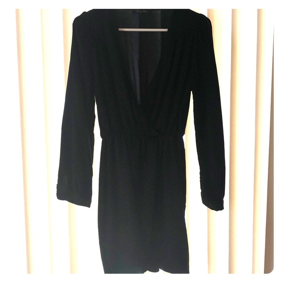 Honey Punch Dresses & Skirts - Short black long sleeve dress, low in the front.